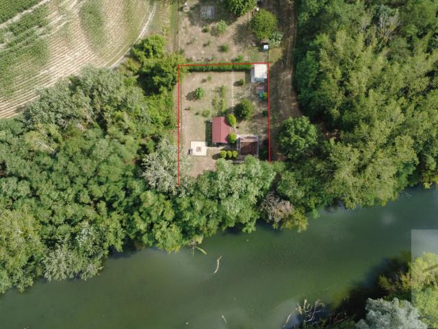 Záhrada (816 m²) pri Malom Dunaji v Malinove s chatkou, altánkom a studňou